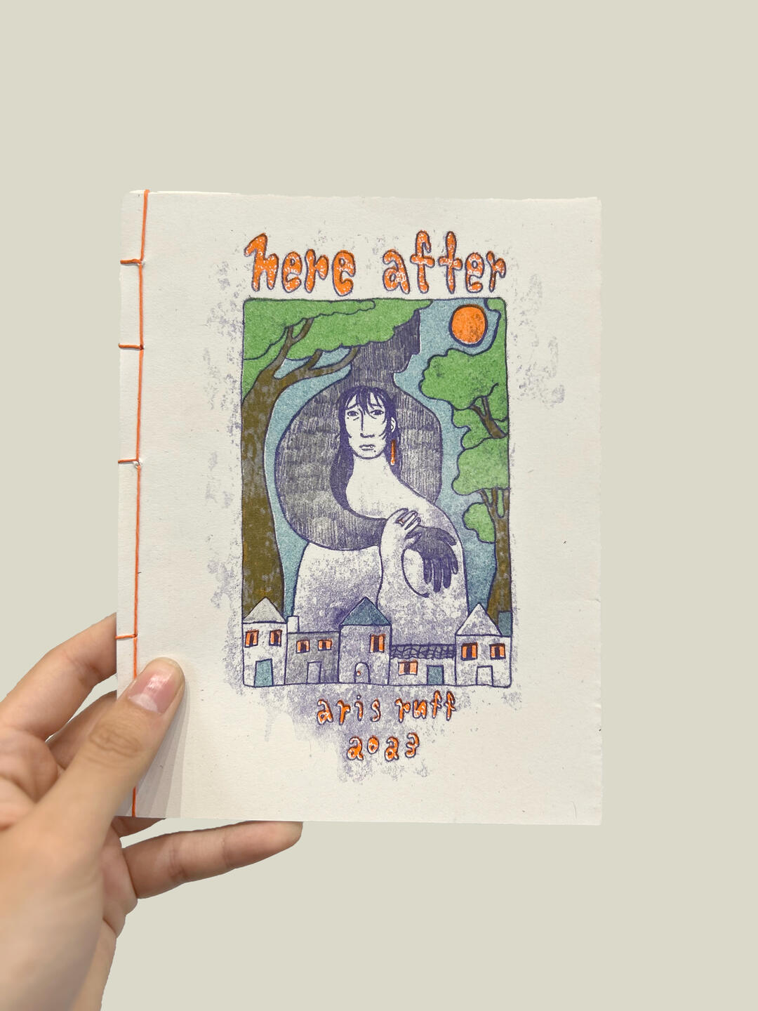 A digital illustration of Aris, looking over his shoulder at the viewer while working at his desk.